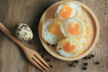 A lot fried quail eggs