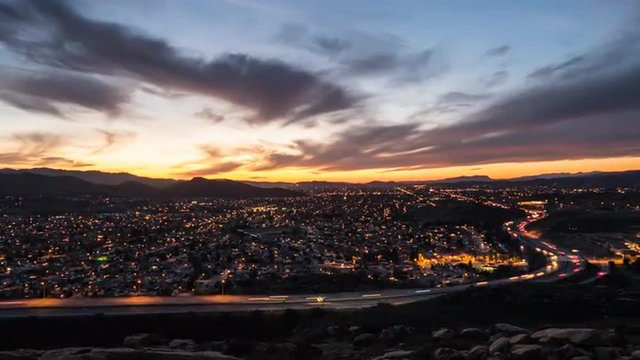 Suburban California sunset twilight time lapse with zoom of Simi Valley near Los Angeles.