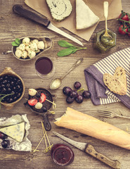 Fototapeta na wymiar French snacks on a wooden background