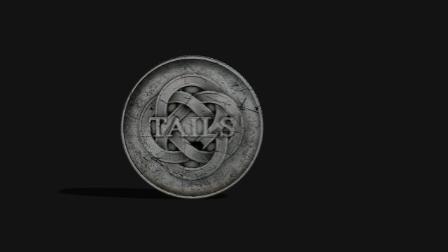 A worn antique silver coin with a heads and tails side spinning on a dark background