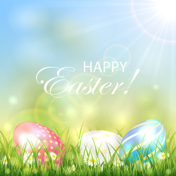 Easter background with three colorful eggs