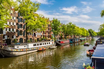 Fotobehang Amsterdam canals and  boats, Holland, Netherlands. © Sergii Figurnyi