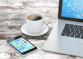 Laptop smartphone and coffee cup 