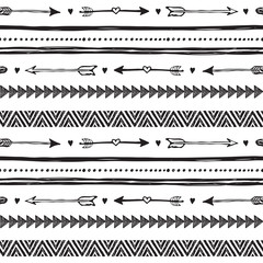 Obraz premium Tribal hand drawn background, ethic doodle pattern.