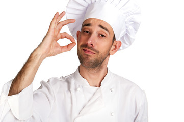Professional chef man. Isolated over white background. Showing p
