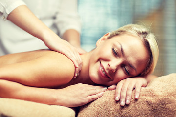 Obraz premium close up of woman lying and having massage in spa