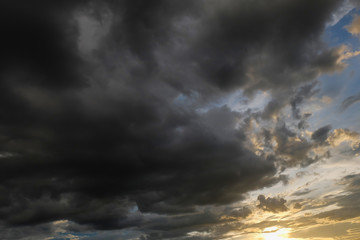 Naklejka na ściany i meble black cloud on sunset dramatic dark sky background