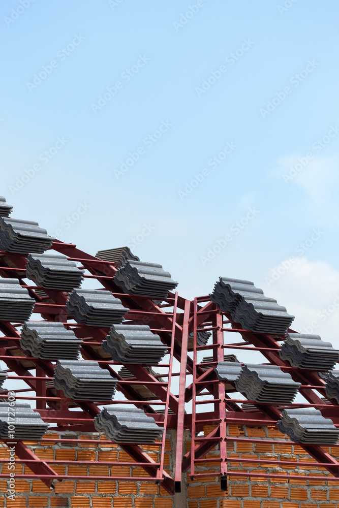 Sticker black tile roof on residential building construction house