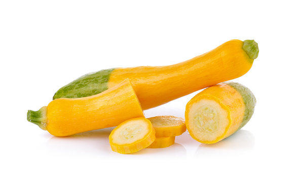 yellow and green zucchini on white background