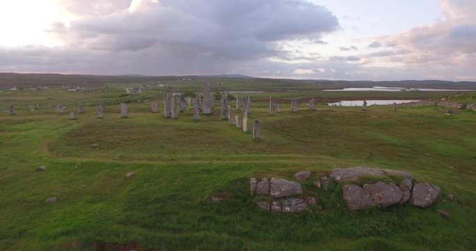 Cinematic aerial shot of Callanish standing stones on the Isle of Lewis, Outer Hebrides, Scotland
