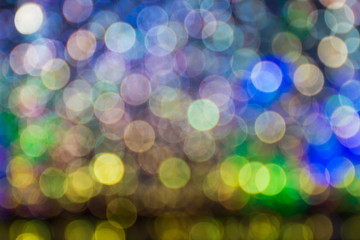 abstract background of blurred yellow lights with bokeh effect,