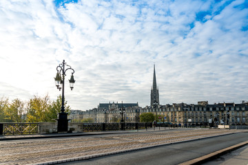 Fototapeta na wymiar Bordeaux river bridge with St Michel cathedral, France