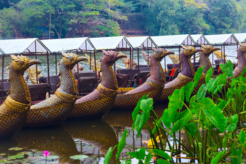 Traditional khmer boats with carved bows