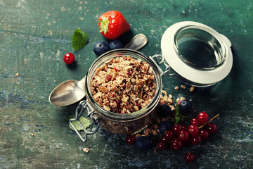 Healthy breakfast of muesli, berries with yogurt and seeds