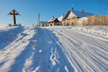 Women's monastery and winter road in Volgoverkhovye