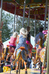 Young girl on a carousel