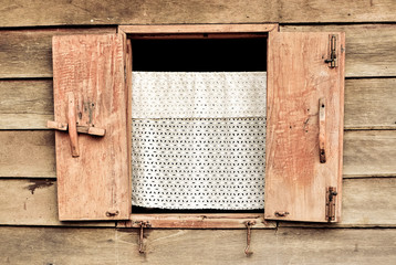 Wooden window at ancient building Bangkok, Thailand 