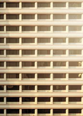 Pattern of balcony with warm light in evening.