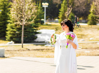 Beautiful woman with spring  flower wreath.