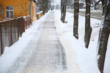 sidewalk in the snow-covered street