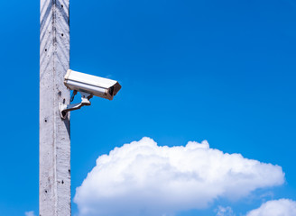 closed circuit camera with blue sky and cloud