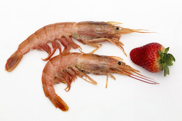 two prawns and a strawberry