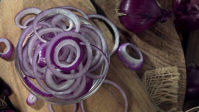 Rotating Red Onion Rings as seamless loopable 4K UHD footage