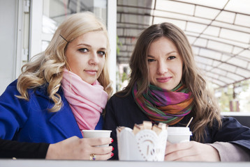 friends having coffee outdoors