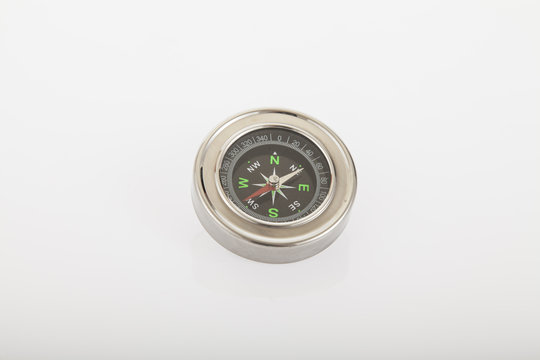 a compass on neutral background