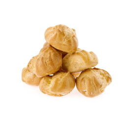 Profiteroles on a white background