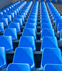 seats are empty on the tribune of stadium