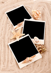 background of the three cards on the sand with shells