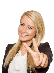 Young woman showing peace sign with her hands - 101760878