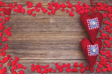Valentines Day background with red hearts. Toned, soft focus 