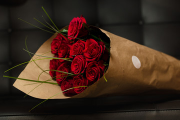 Bouquet of red roses on black background