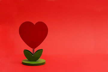 Heart-shaped tree on a red background
