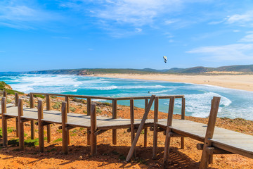 Walkway to Praia do Bordeira beach and beautiful blue sea view, Algarve region, Portugal