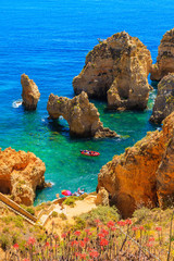 Tourist boats on turquoise sea water at Ponta da Piedade, Algarve region, Portugal