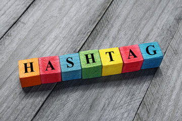 hashtag text on colorful wooden cubes
