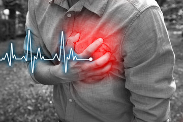 Man having chest pain - heart attack, outdoors