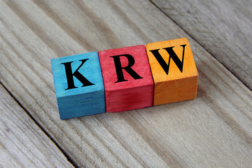 KRW (South Korean Won) sign on colorful wooden cubes