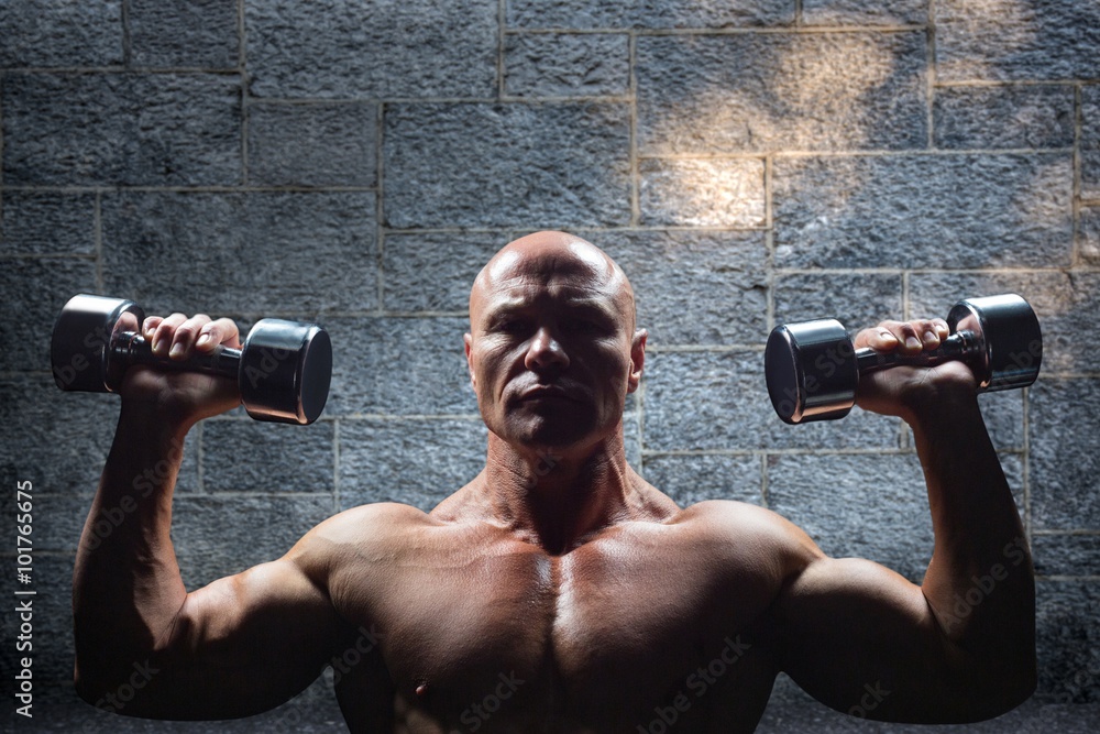 Poster composite image of portrait of man exercising with dumbbells
