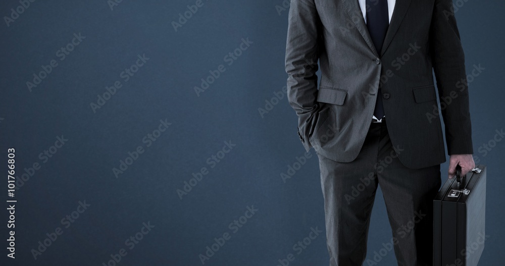 Poster Composite image of businessman standing with his briefcase