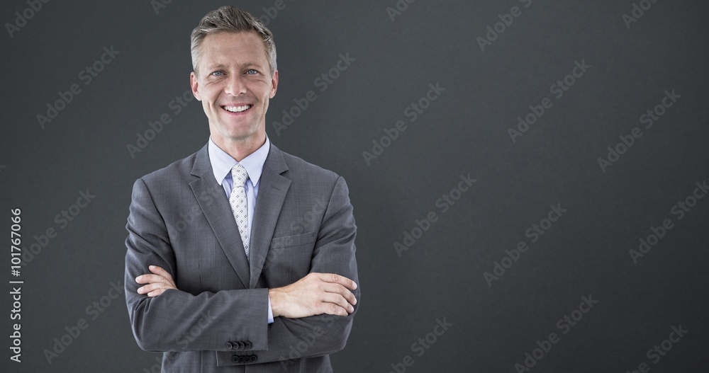 Poster Composite image of smiling businessman sith arms crossed