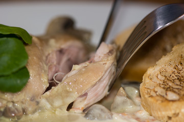 Lapin à la moutarde. A classic French dish of rabbit in a mustard sauce
