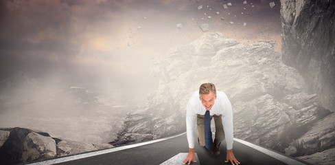 Composite image of business people ready to start race