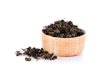 Heap of dried green tea on white background