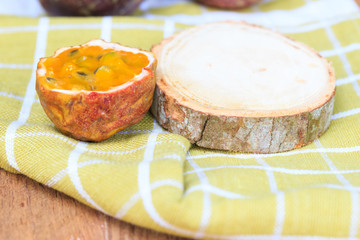 Passion fruit on wooden background