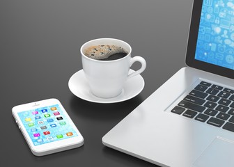 Obraz na płótnie Canvas Laptop smartphone and coffee cup