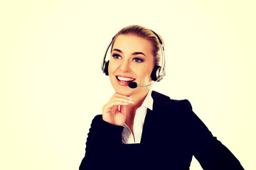 Young helpline operator in headset